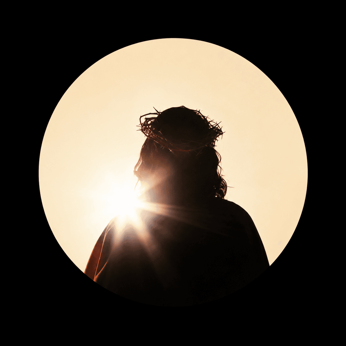 Silhouette of Jesus Christ wearing the Crown of Thorns with radiant sunlight shining behind Him against a dark background, symbolizing faith and redemption.
